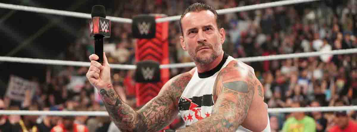 CM Punk sits in the ring