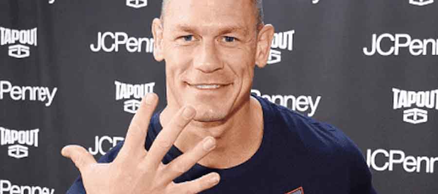 John Cena holding up five fingers